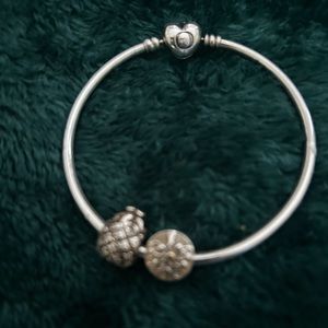 Pandora Bracelet with two charms. Tree of Life and Pineapple